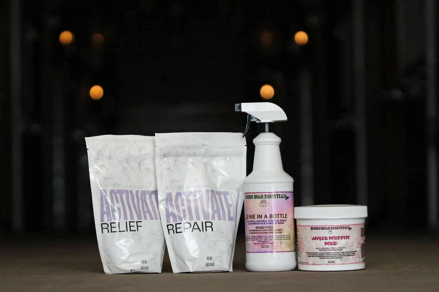 The 360° Equine Recovery Bundle by Rodeo Road Essentials featuring four essential products: Activate Relief and Repair powders, Genie In A Bottle spray, and Angel Muffin Mud poultice, designed to enhance recovery for high-performance horses.