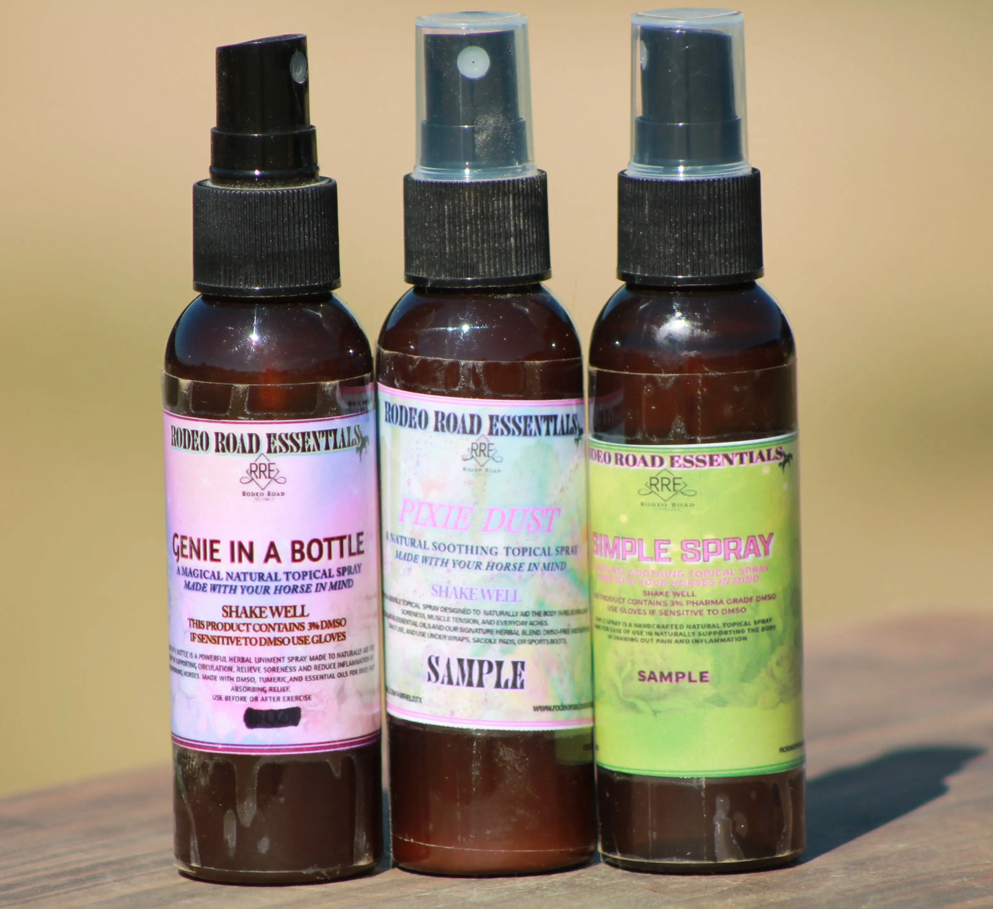 Variety of 2oz sample bottles from Rodeo Road Essentials featuring Genie in a Bottle, Pixie Dust, and Simple Spray. Perfect for trying out new products. Ideal for those seeking Samples.