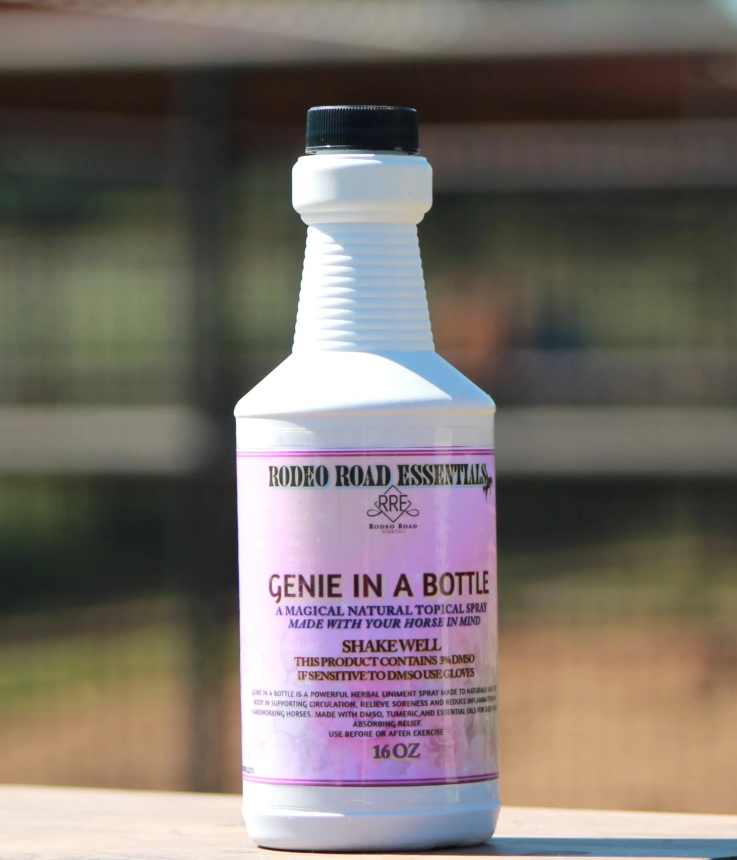 Close-up view of Genie In A Bottle by Rodeo Road Essentials, showcasing the 16 oz herbal liniment for providing deep relief to performance horses.