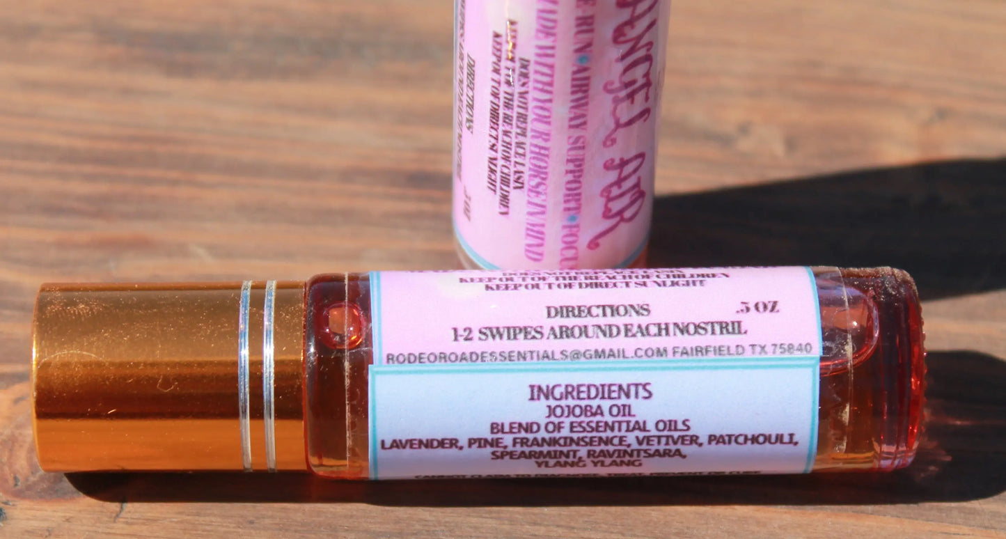 Detailed view of Angel Air roll-on showing ingredients and application directions. This pre-run aromatherapy blend supports horse respiratory function and focus.