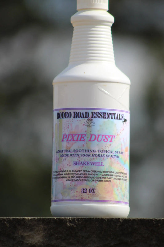 Rodeo Road Essentials Pixie Dust Spray - A soothing herbal mist in a spray bottle, perfect for calming sore muscles in horses.