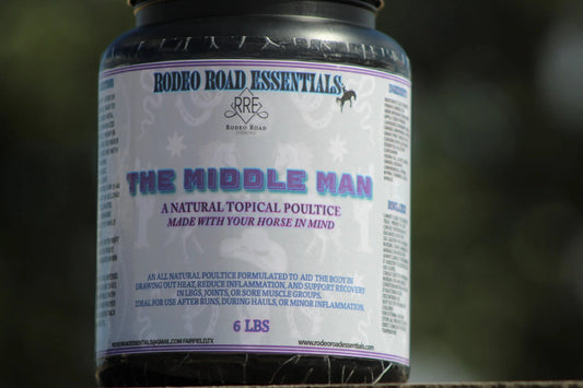 Close-up view of The Middle Man Poultice by Rodeo Road Essentials, highlighting its 6 lb tub that offers targeted recovery solutions for equine athletes after intense activity.