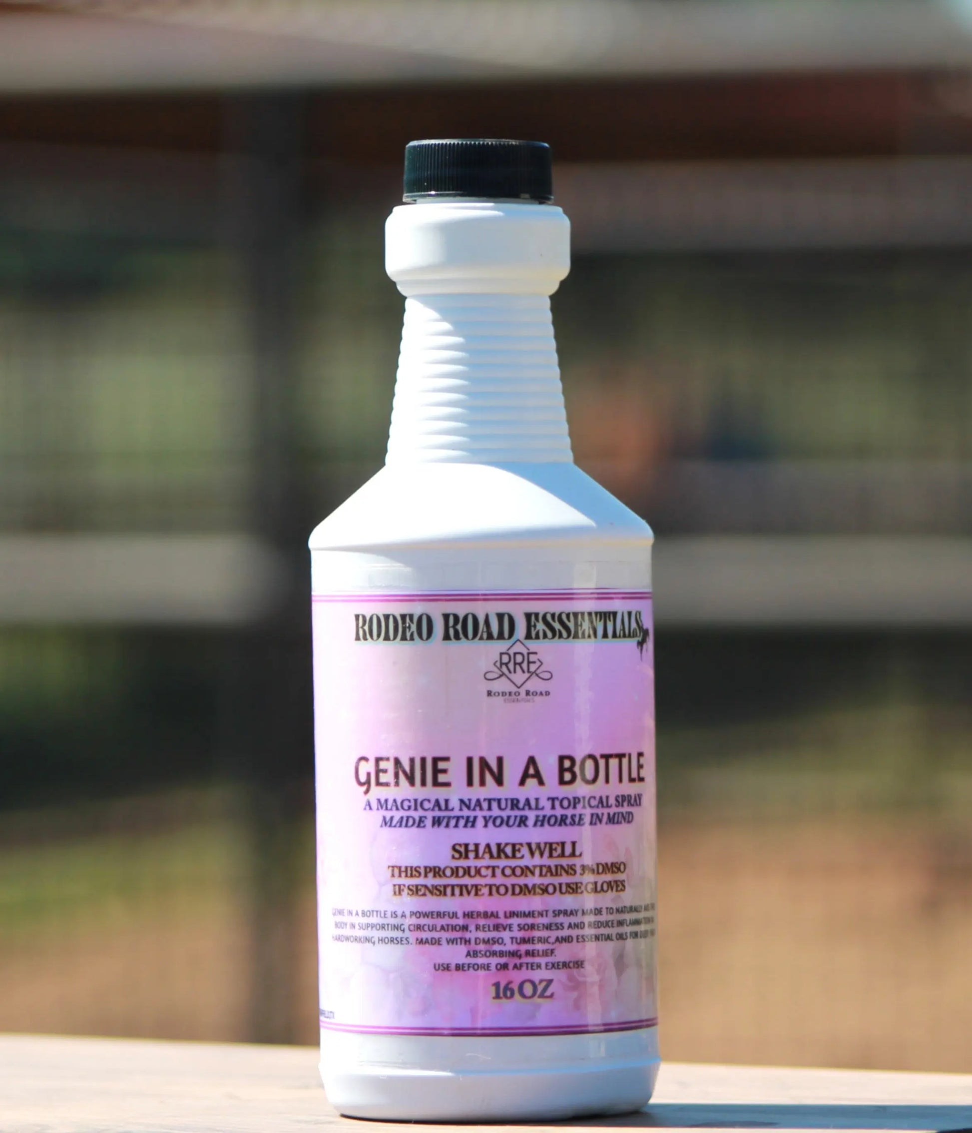 Close-up view of Genie In A Bottle by Rodeo Road Essentials, showcasing the 16 oz herbal liniment for providing deep relief to performance horses.