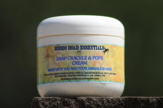 Close-up image of the Snap Crackle & Pops Cream by Rodeo Road Essentials, showcasing its packaging. Ideal for providing natural comfort and relief from muscle, joint, and stiffness issues.