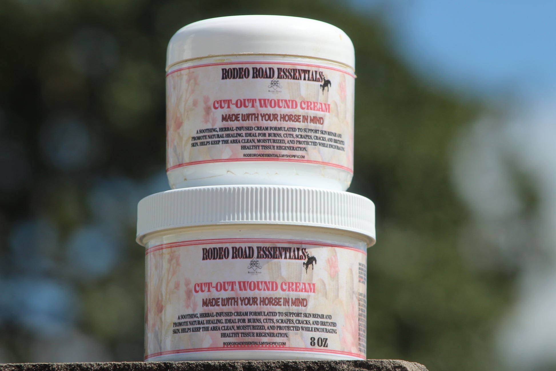 CUT-OUT Wound Cream from Rodeo Road Essentials, shown in two product jars, ideal for healing cuts, scrapes, burns, and skin repair.